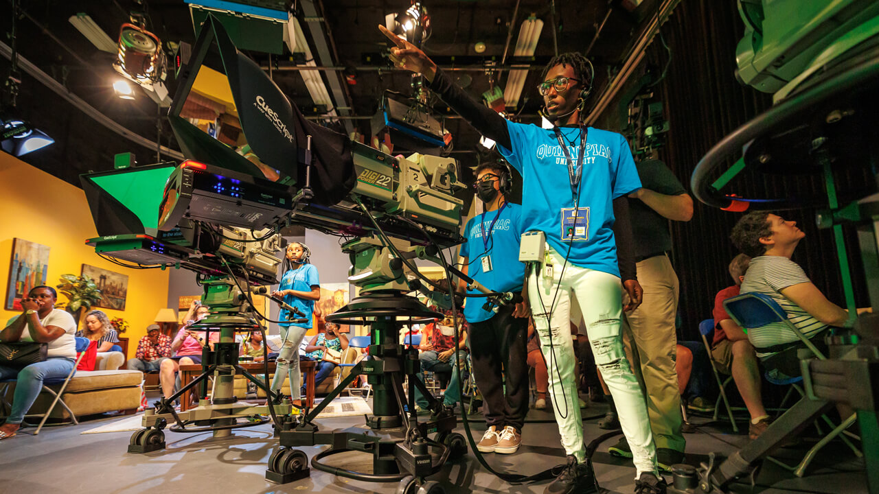 Dozens of high school students operate cameras in the Quinnipiac video studios